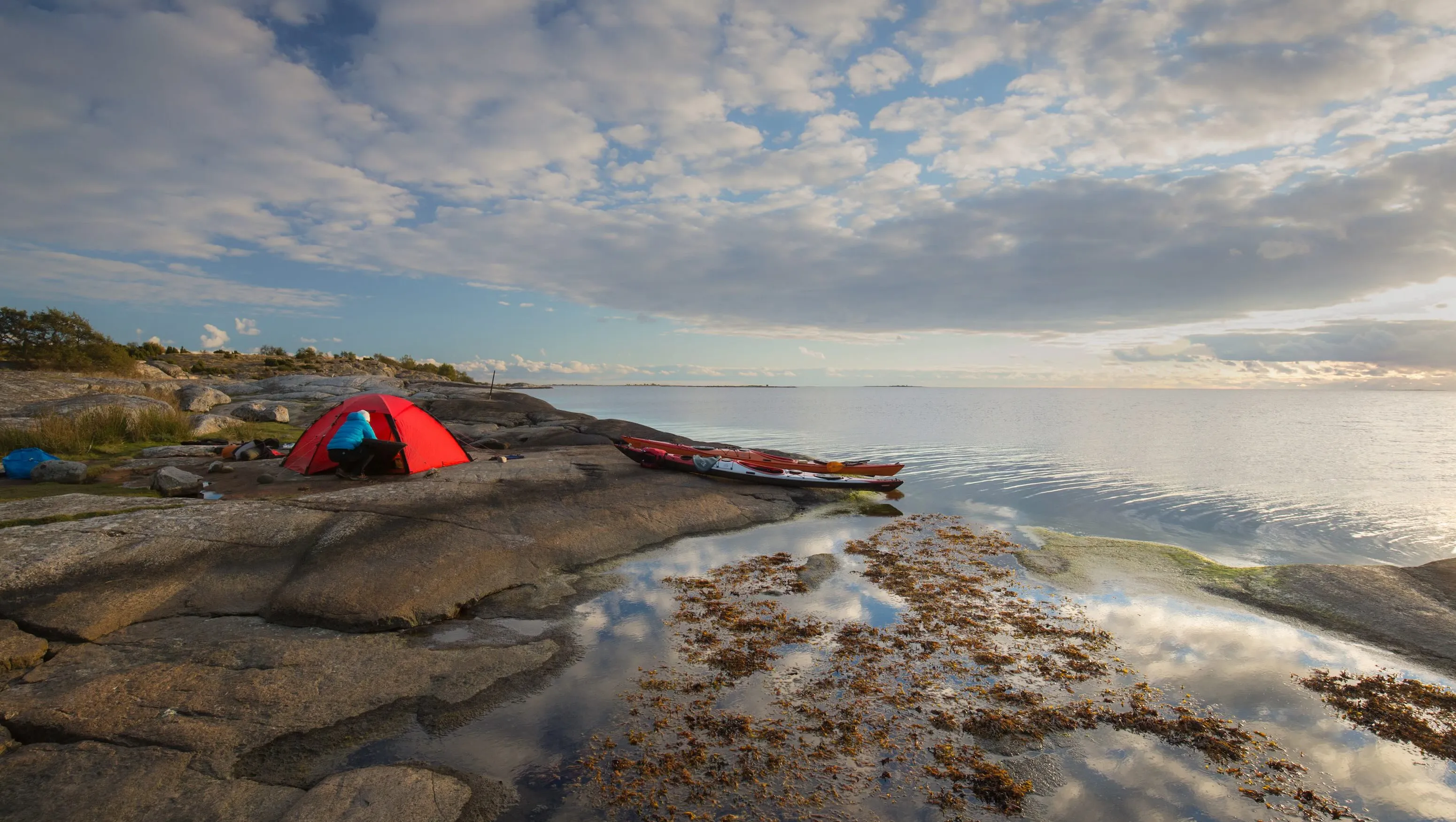 A Hilleberg tent next to the ocean